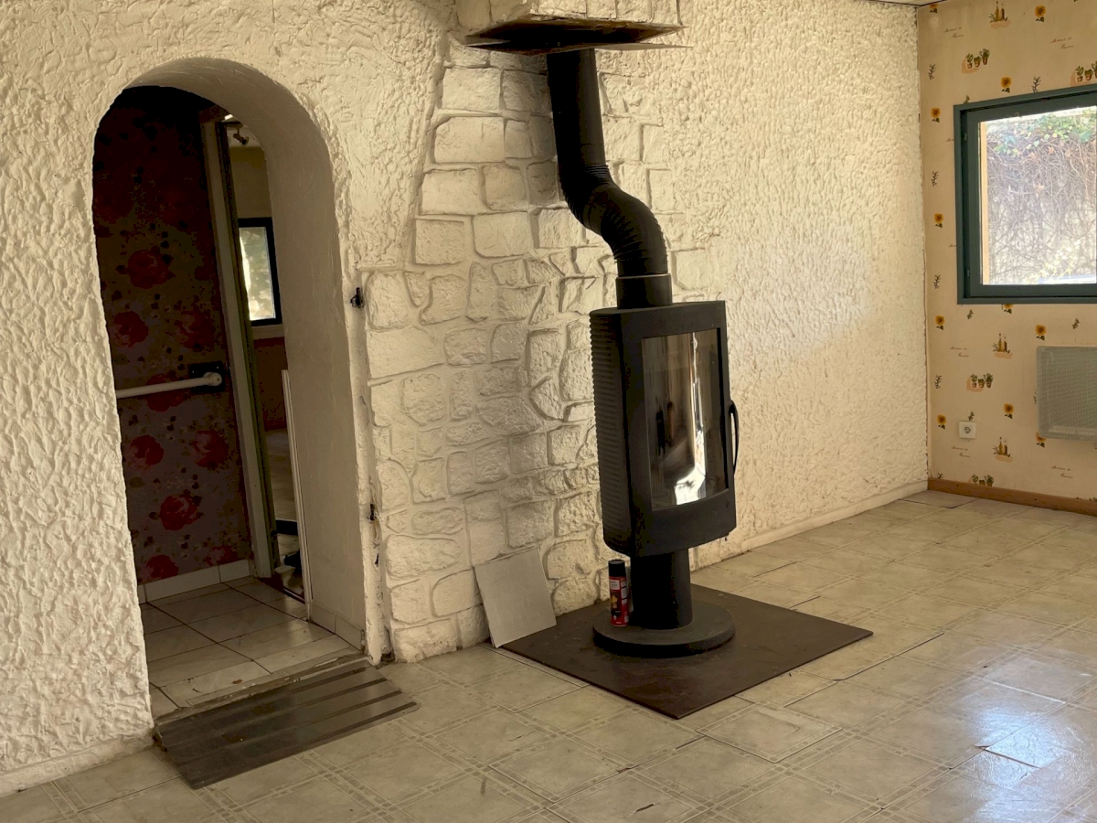 UNE GRANDE  MAISON AVEC UN ESPACE DE VIE DE 212 M2  .